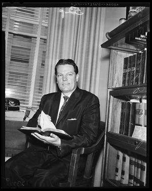 Jaggers seated in his office, 1958